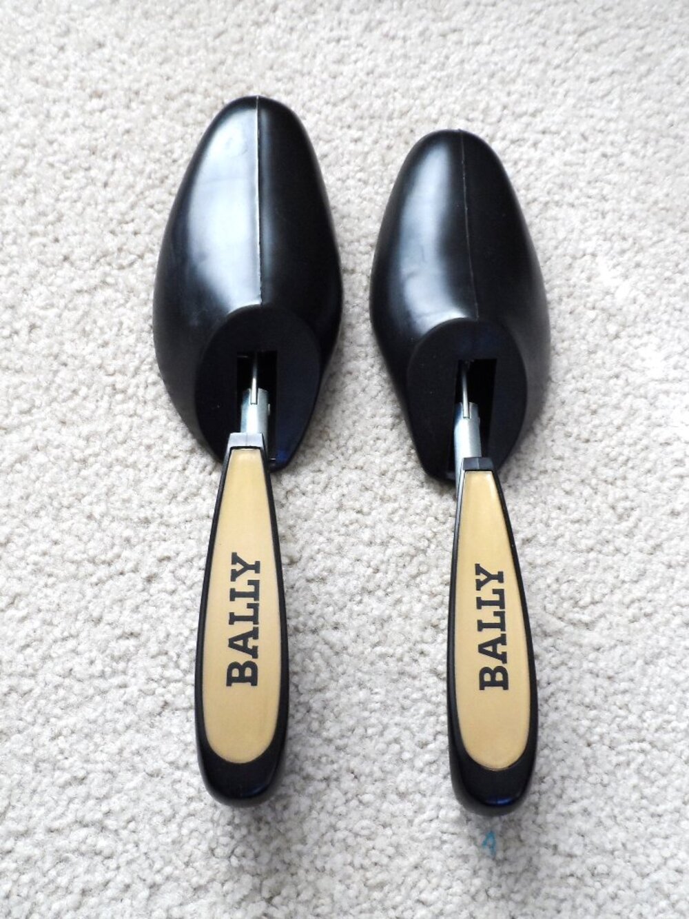 Bally- shoe trees featuring black plastic toe